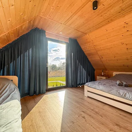 Dom wakacyjny Na Skraju Lasu *